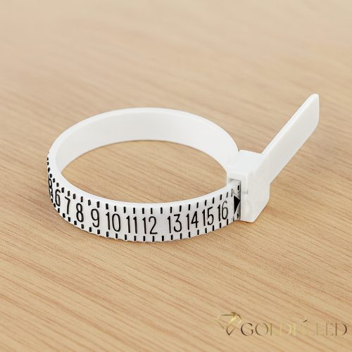 Ring size measuring tool — инструмент за измерване на размера на пръстен (Ring sizer) Това е регулируем пластмасов уред, с който може точно да се измери обиколката на пръста при покупка на пръстен.